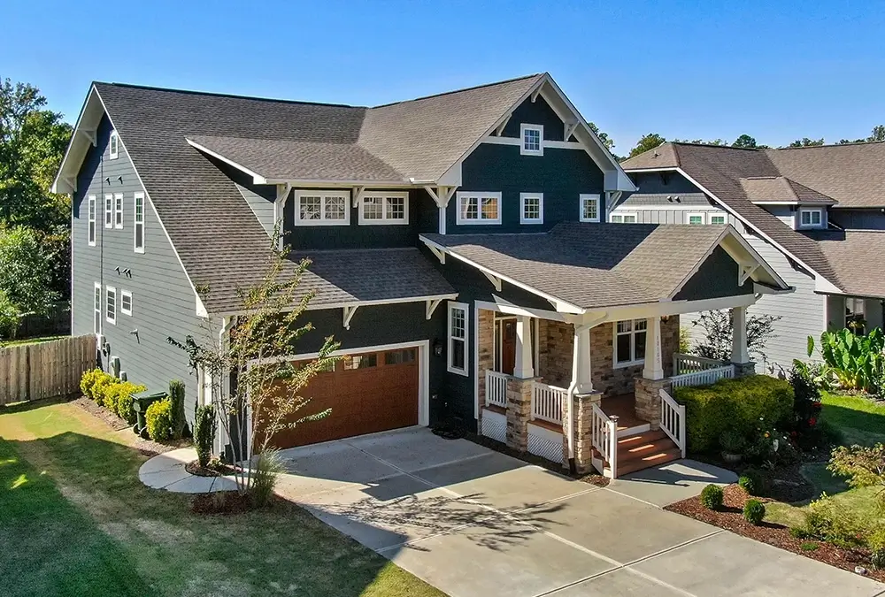 A large house with a lot of windows and doors.